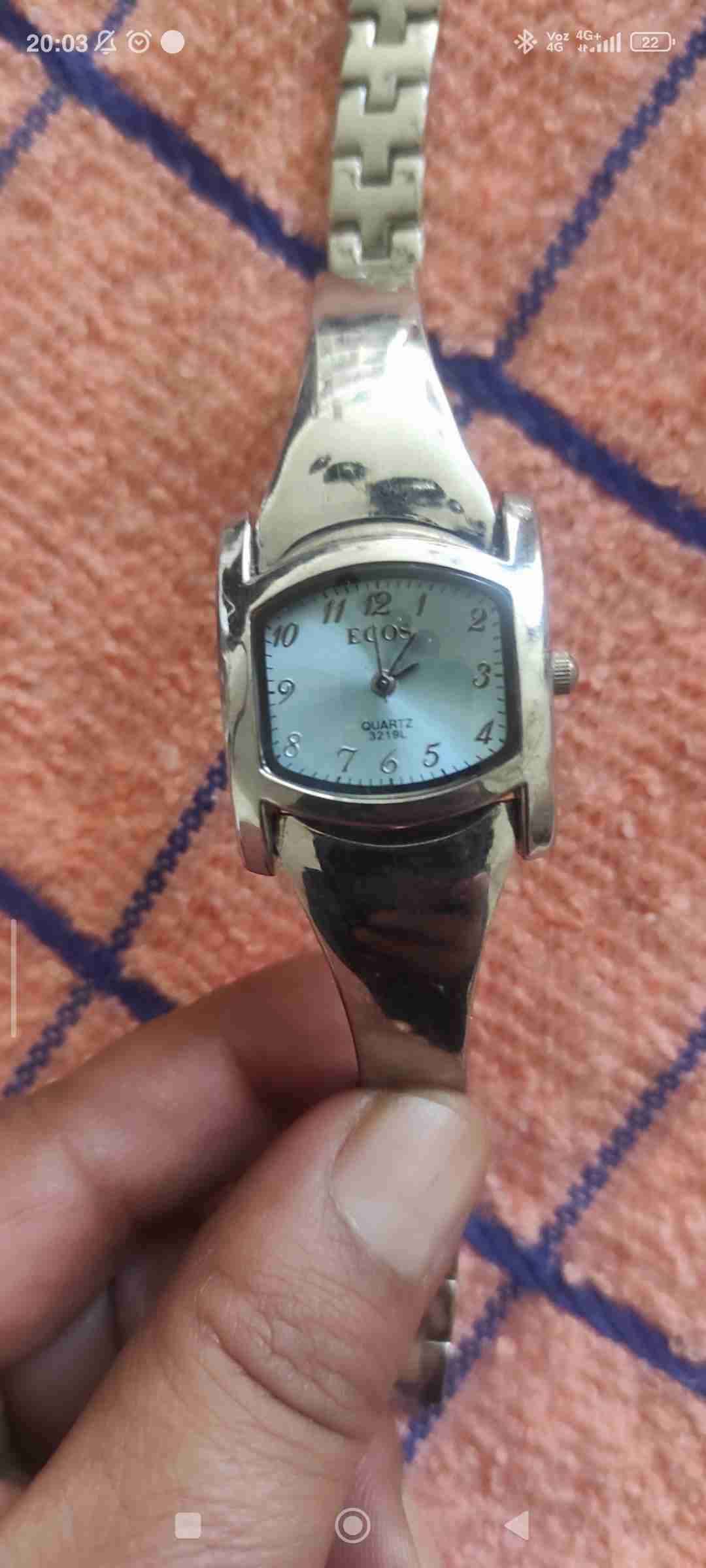 Reloj de pulsera ángulo plateado