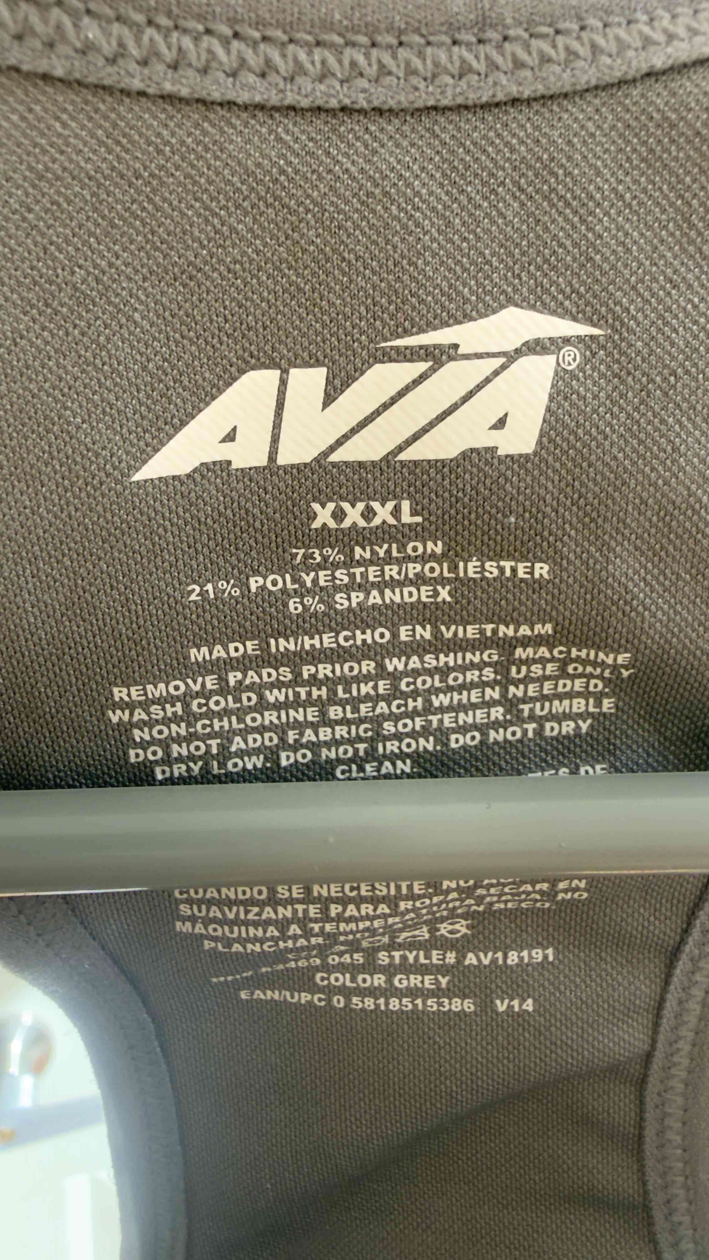 Top deportivo gris con cremallera - miniatura 3