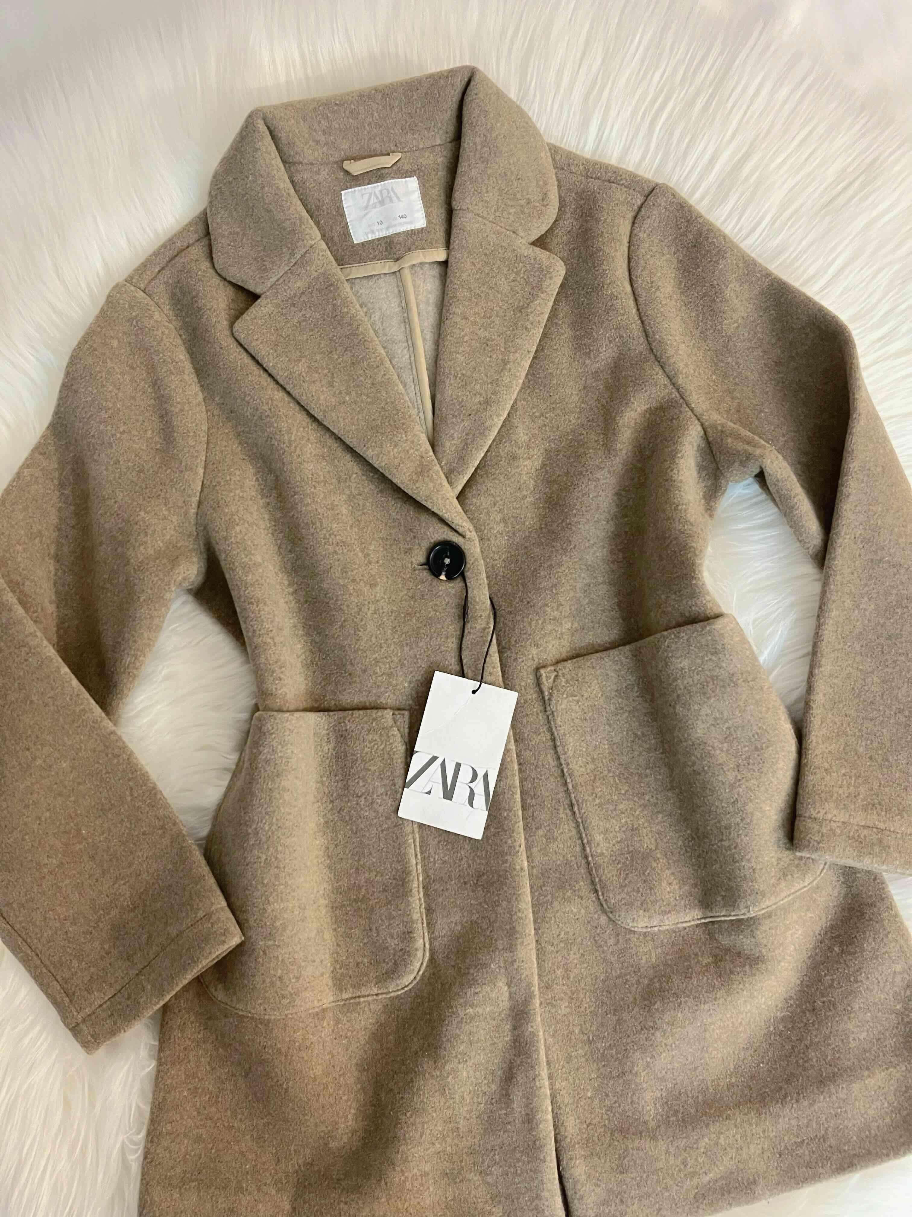 Abrigo Zara beige niño unisex talla 10 años - miniatura 1