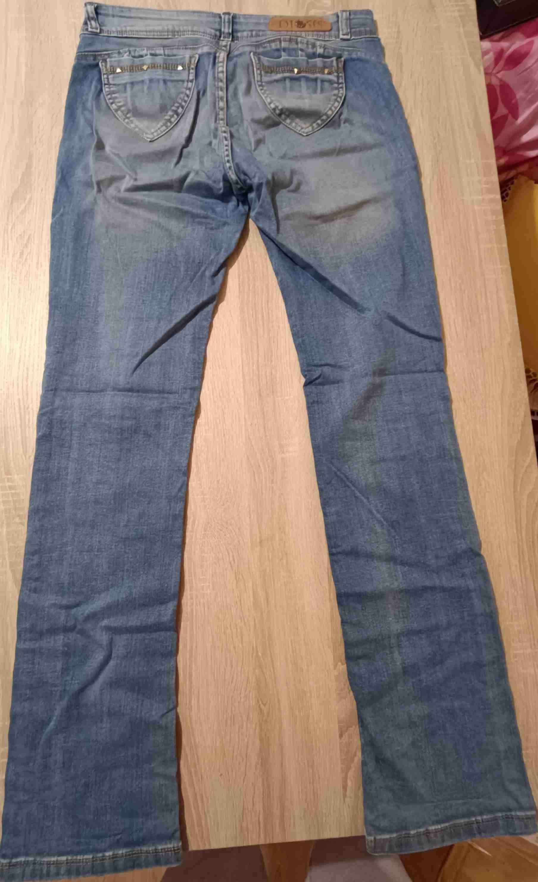 Jeans azules con roturas - miniatura 2