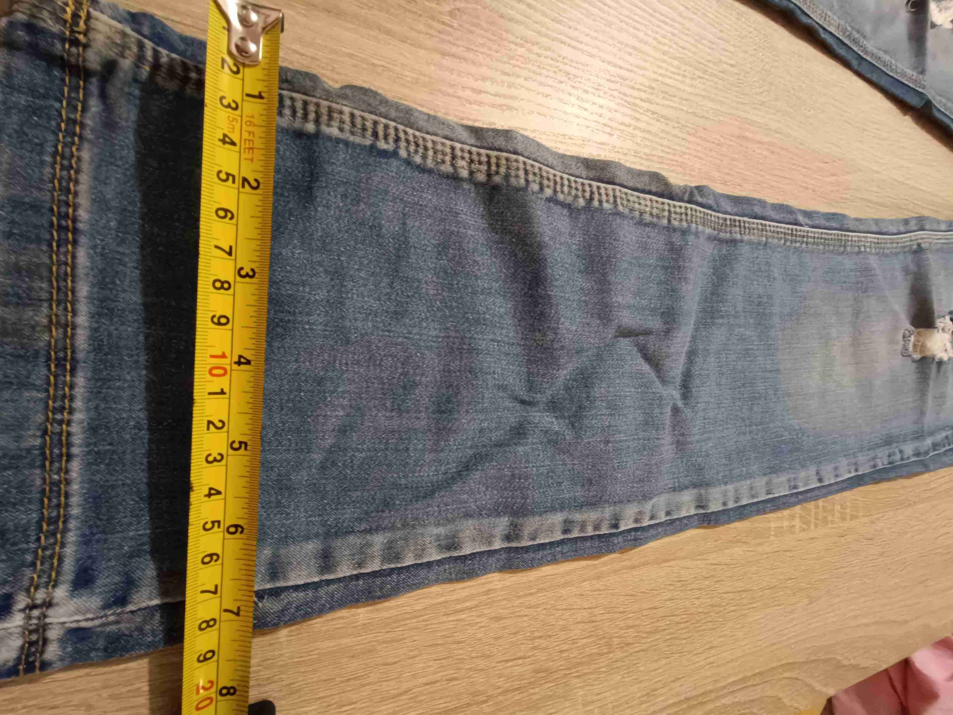 Jeans azules con roturas - miniatura 4