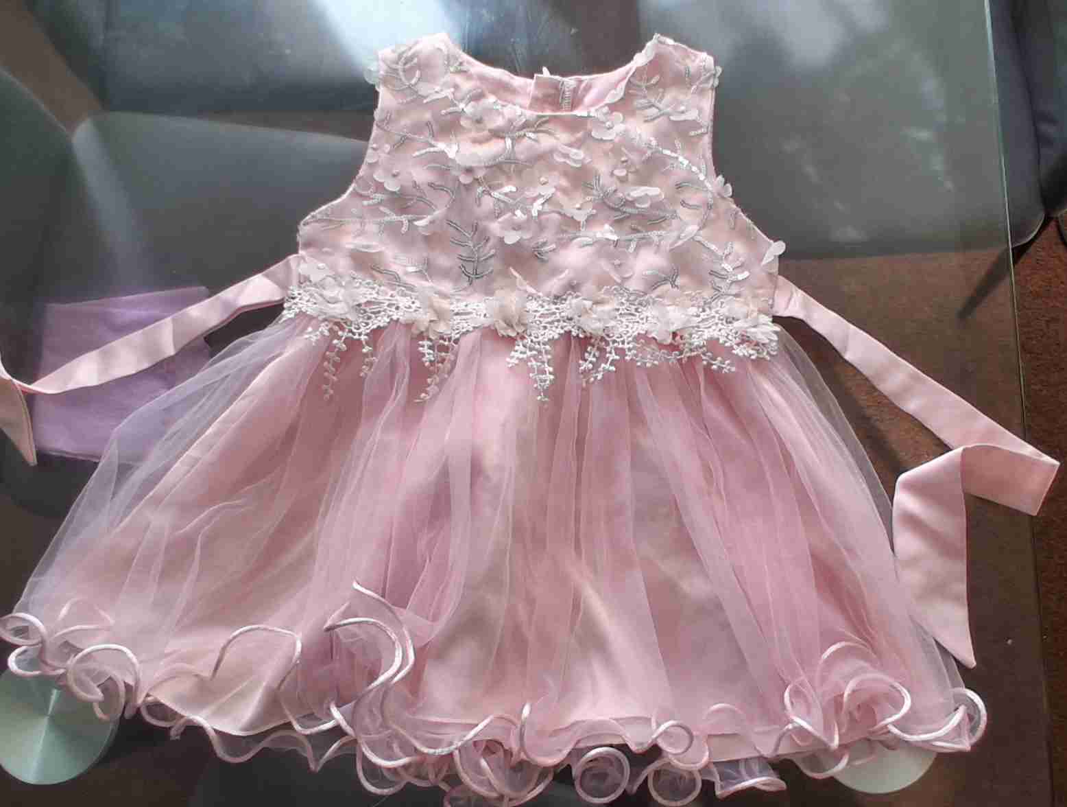 Vestido rosado para bebé