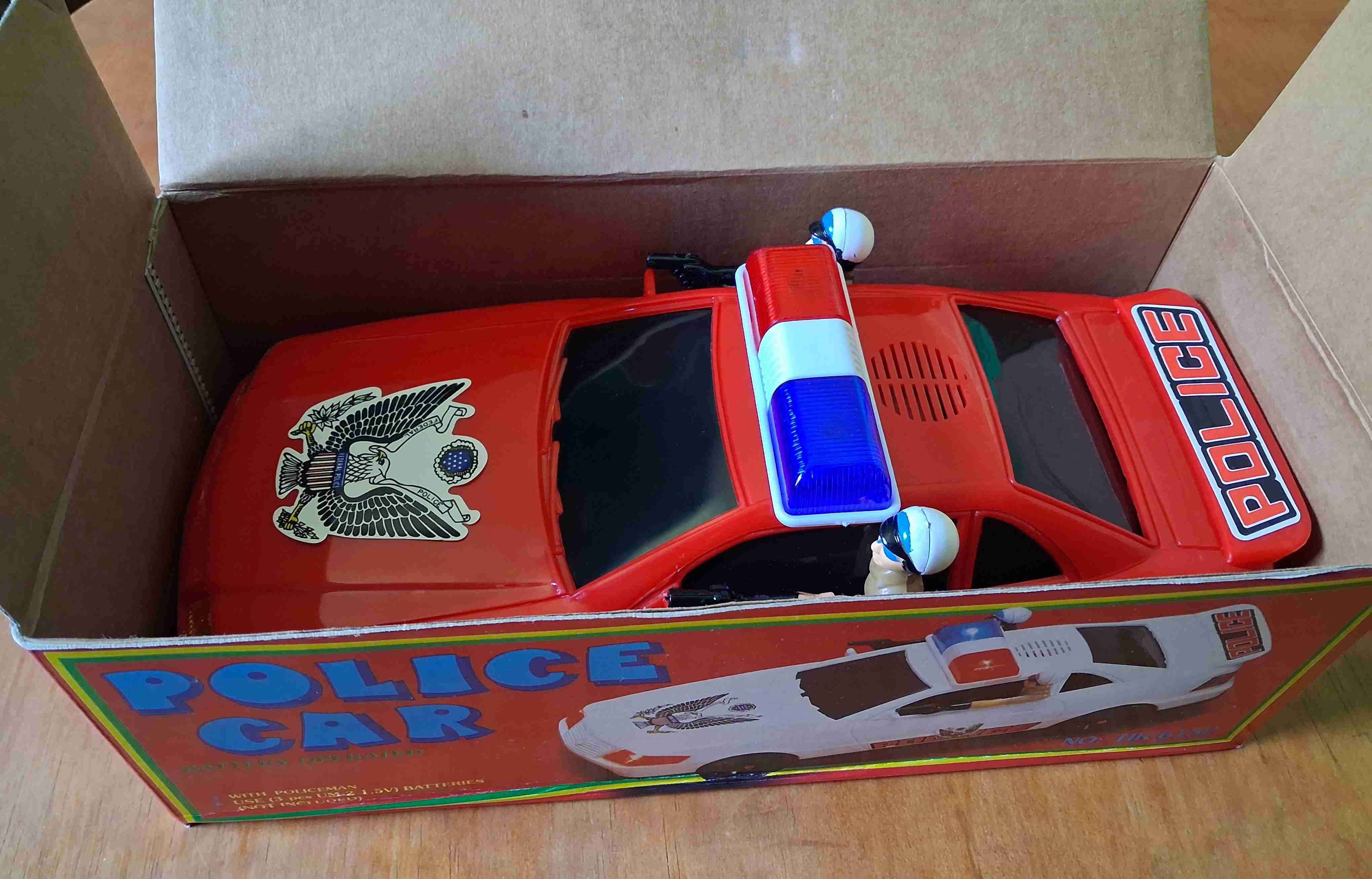 Auto de juguete policía rojo - miniatura 2