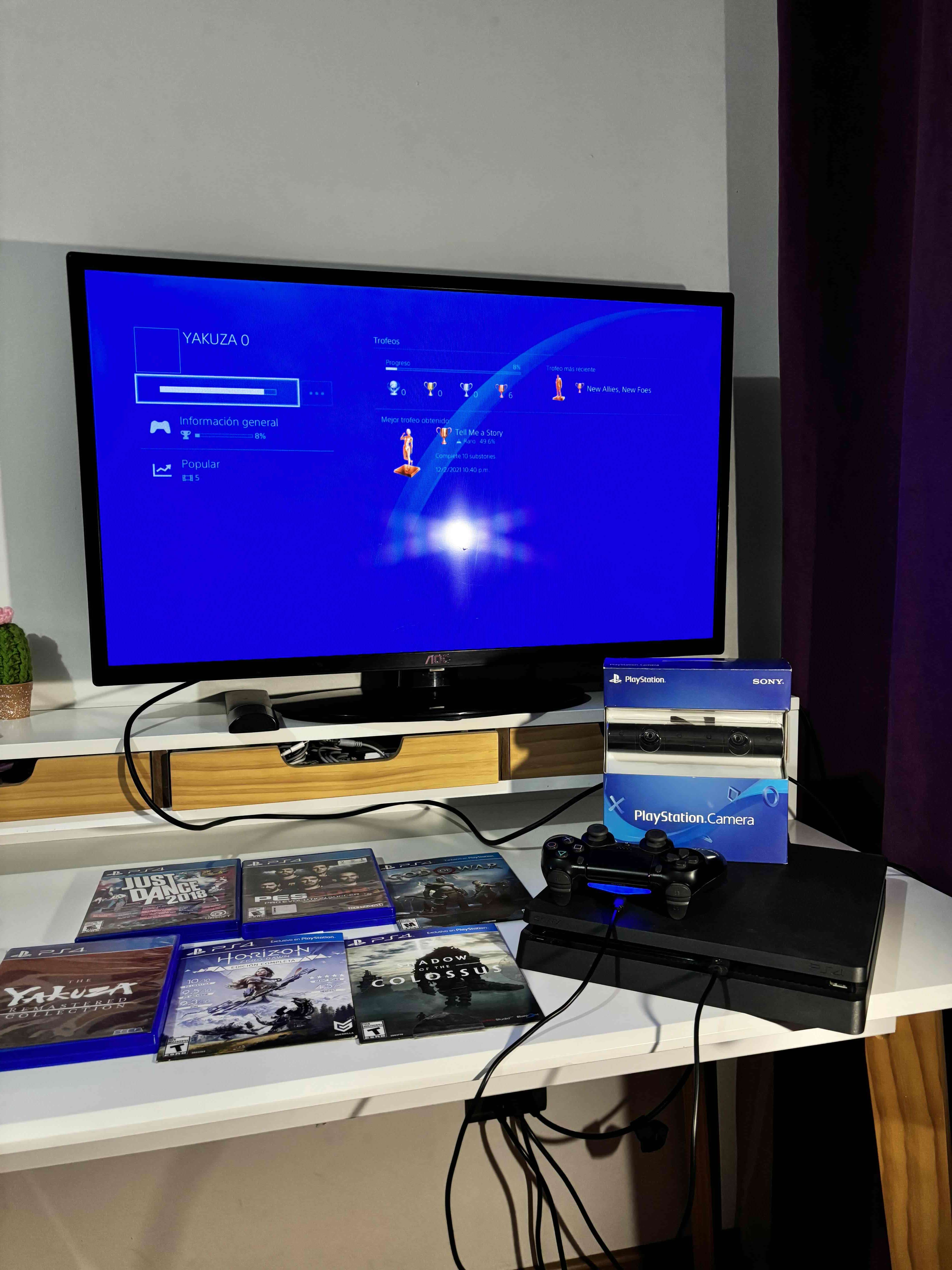 PS4 con juegos y cámara - miniatura 4